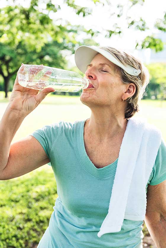 woman-drinking-water-from-bottle