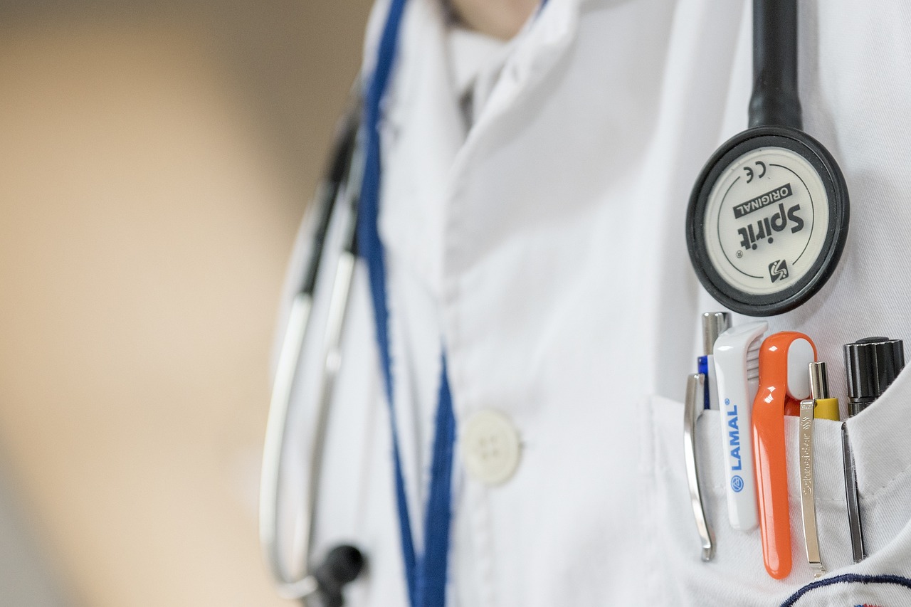 Doctor in gown with stethoscope