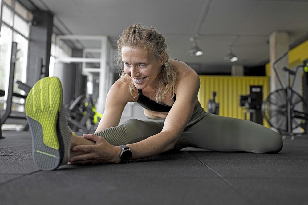 woman-stretching-leg